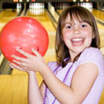 happy girl bowling