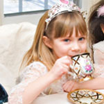 little girl at a tea party